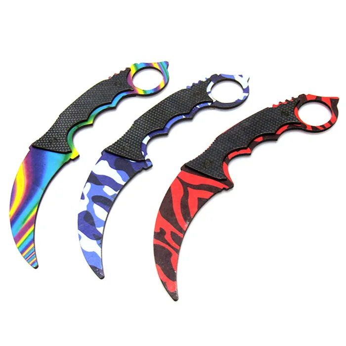 Керамбит игр. Карамбит или керамбит. Нож Karambit. Игрушка нож керамбит. Деревянные ножи керамбиты.